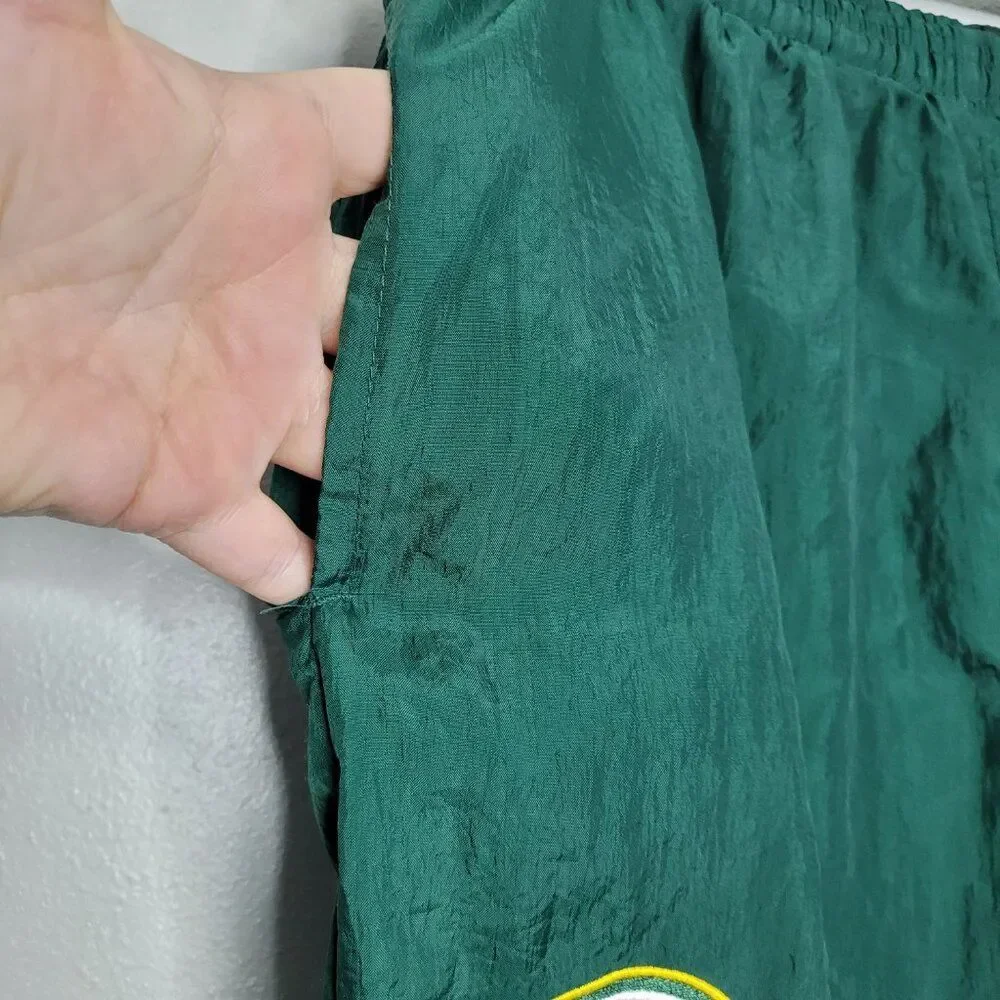 Vintage 90s Green Bay Packers lined windbreaker pants zip ankles size xl